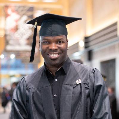 Roshawn C. at commencement in New York City.