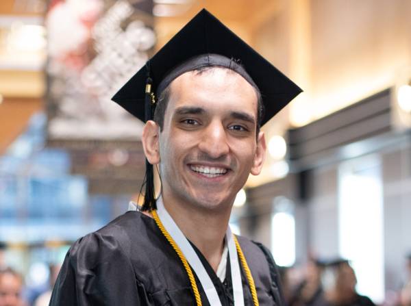 Jonathan C. at commencement in New York City.
