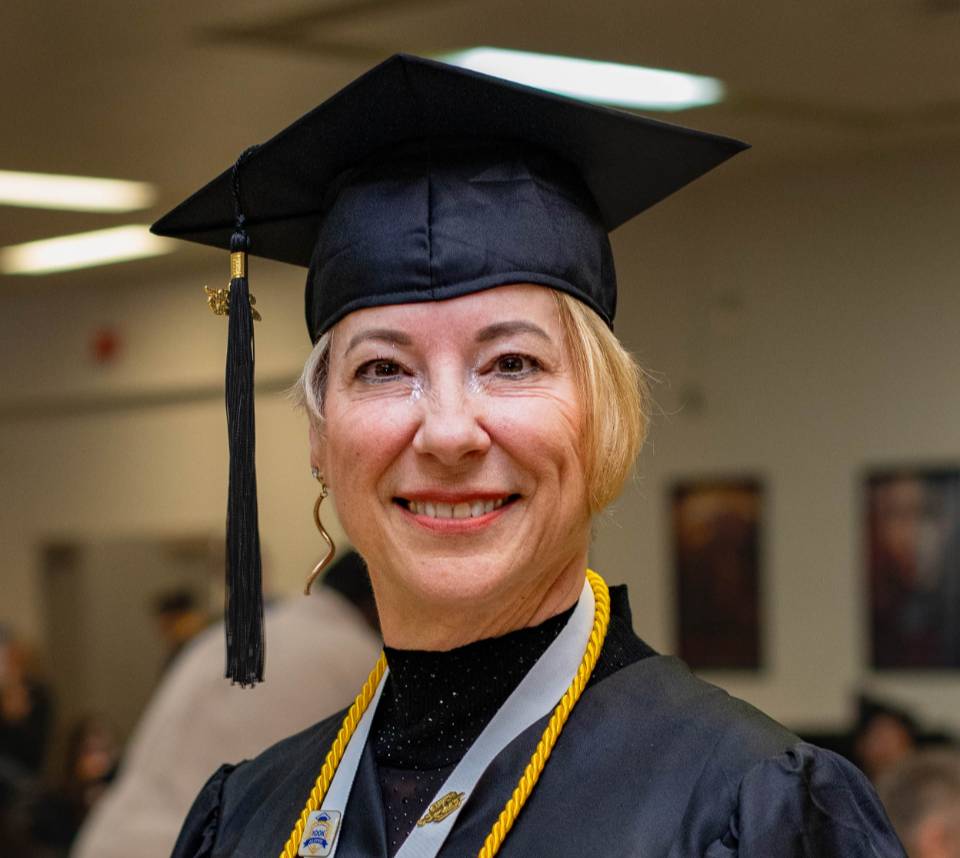 Nancy N. at commencement in Rochester.