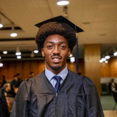 Nathaniel W. at commencement in Albany.