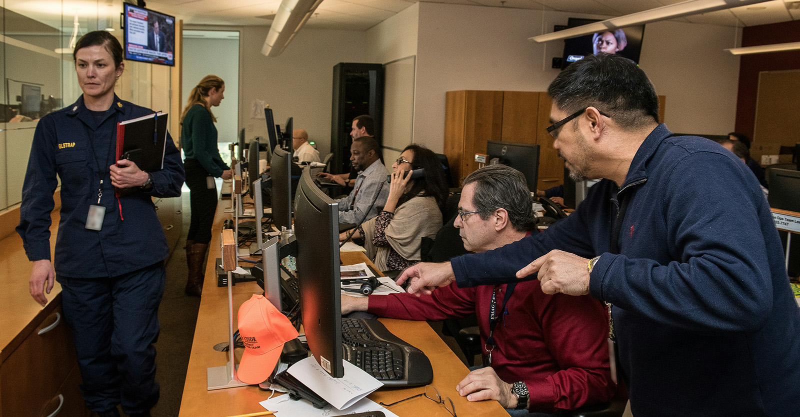 group of people working in emergency management