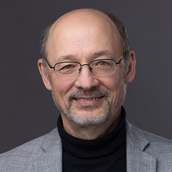 headshot of Valeri ("Val") Chukhlomin