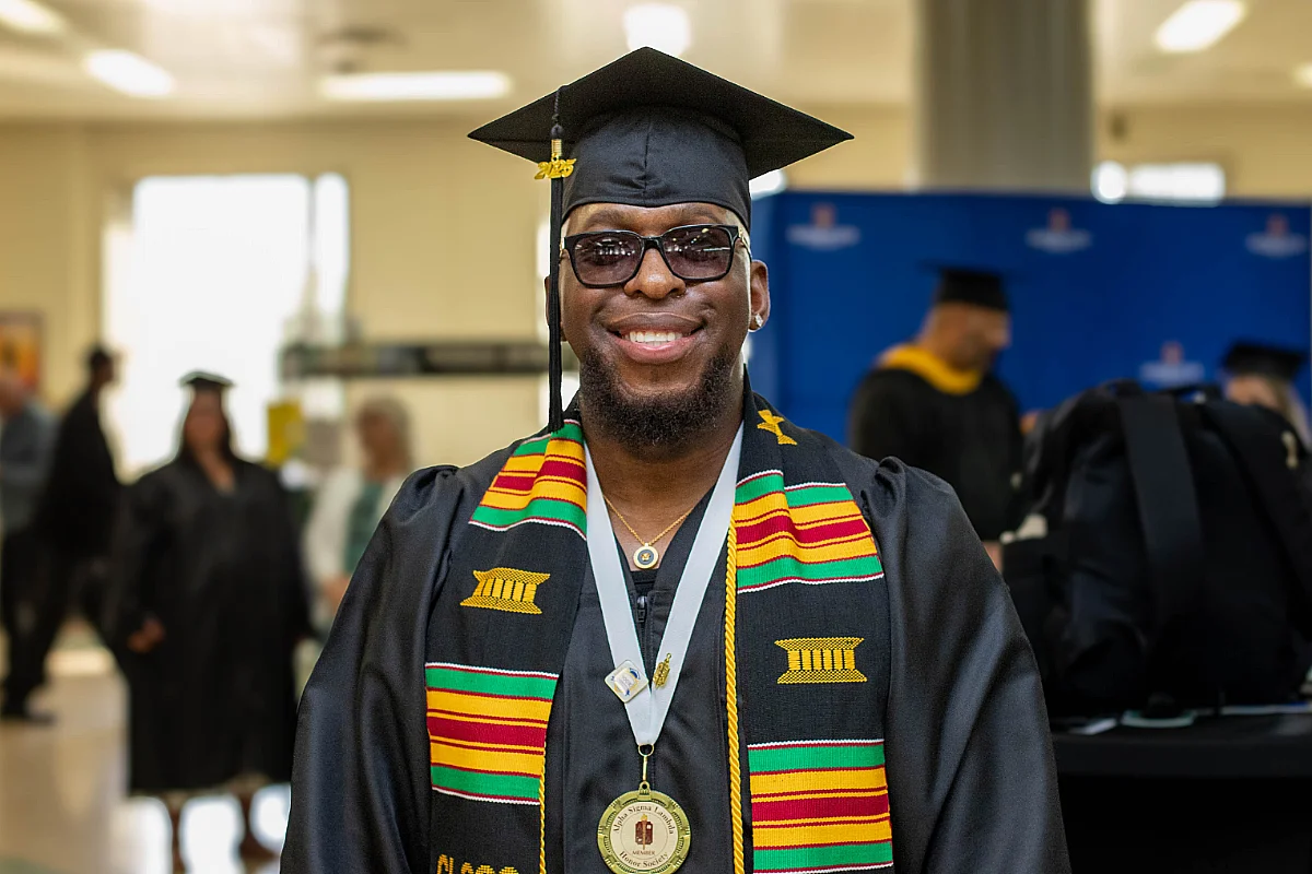Cleveland J. at commencement in Rochester.