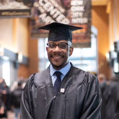 Paul C. at commencement in New York City.