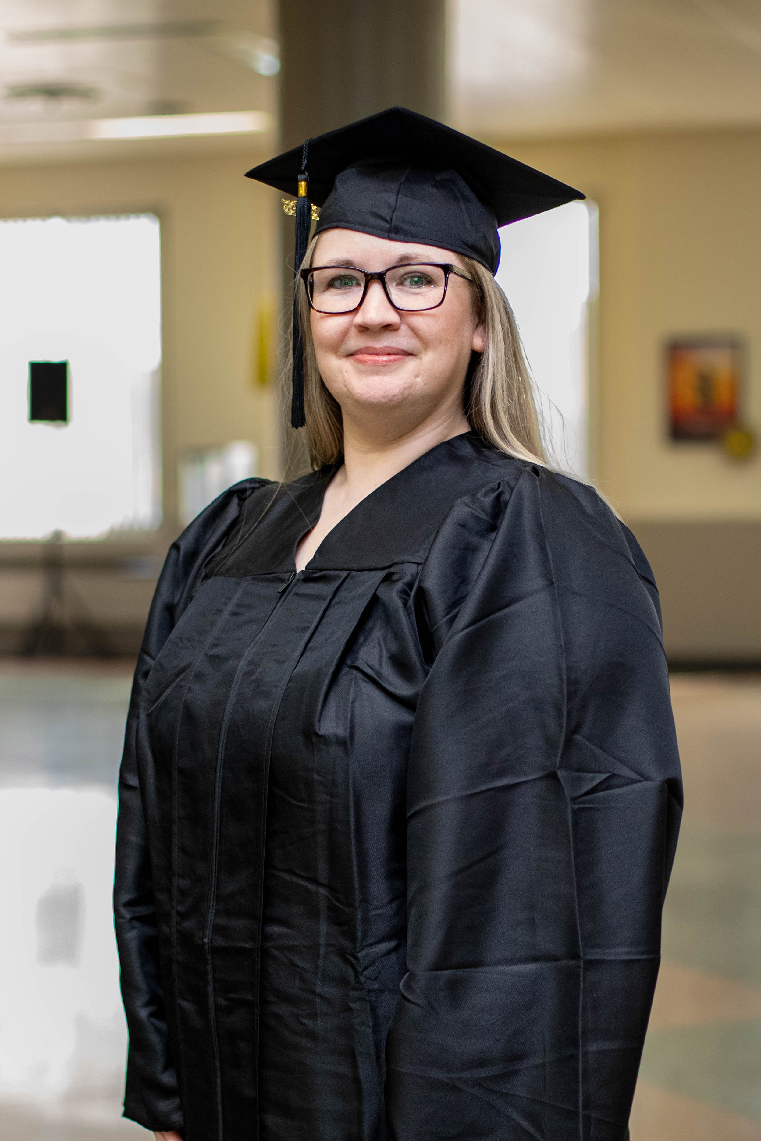 Jeanette B. at commencement in Rochester.