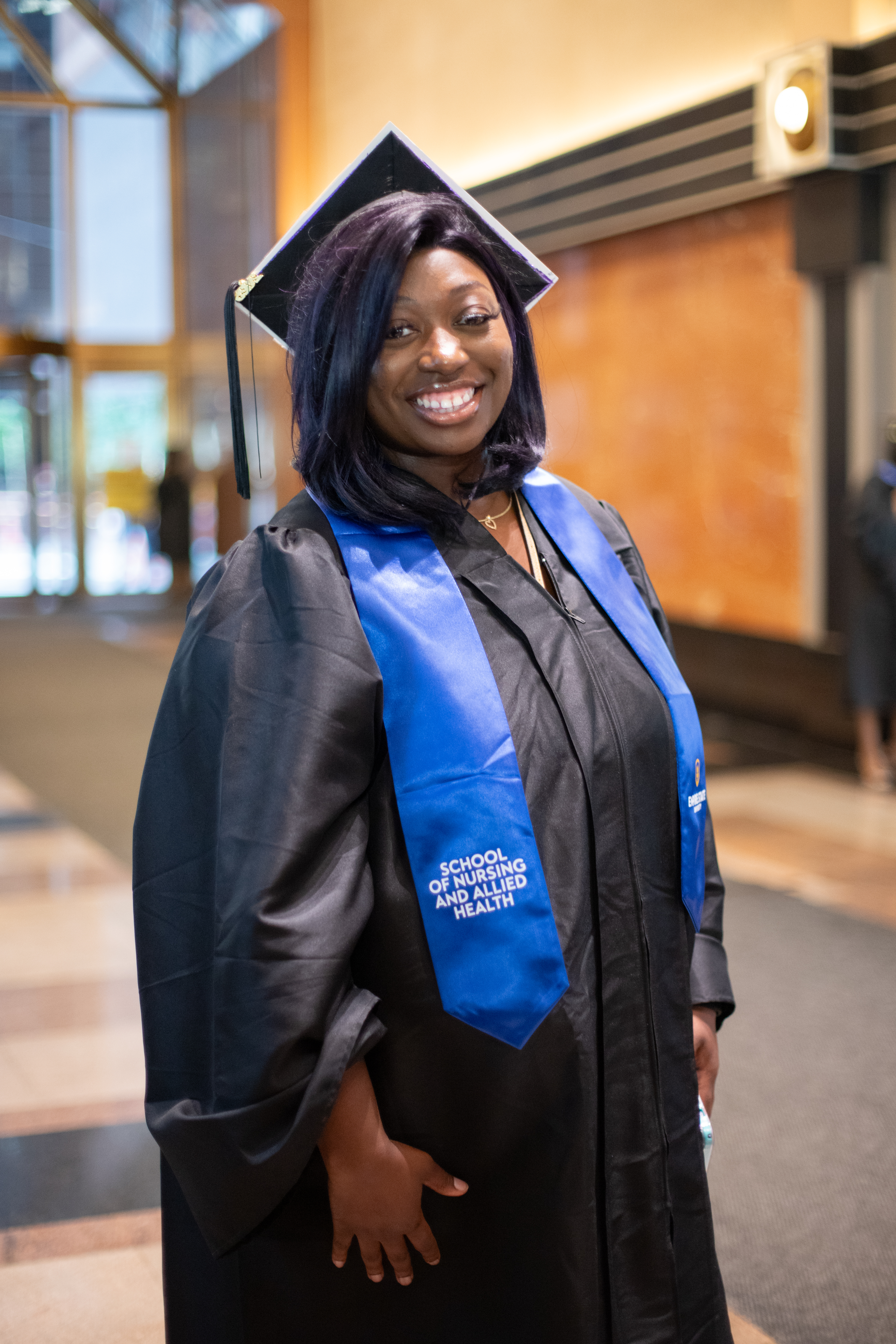 Jasmine E. at commencement in New York City.