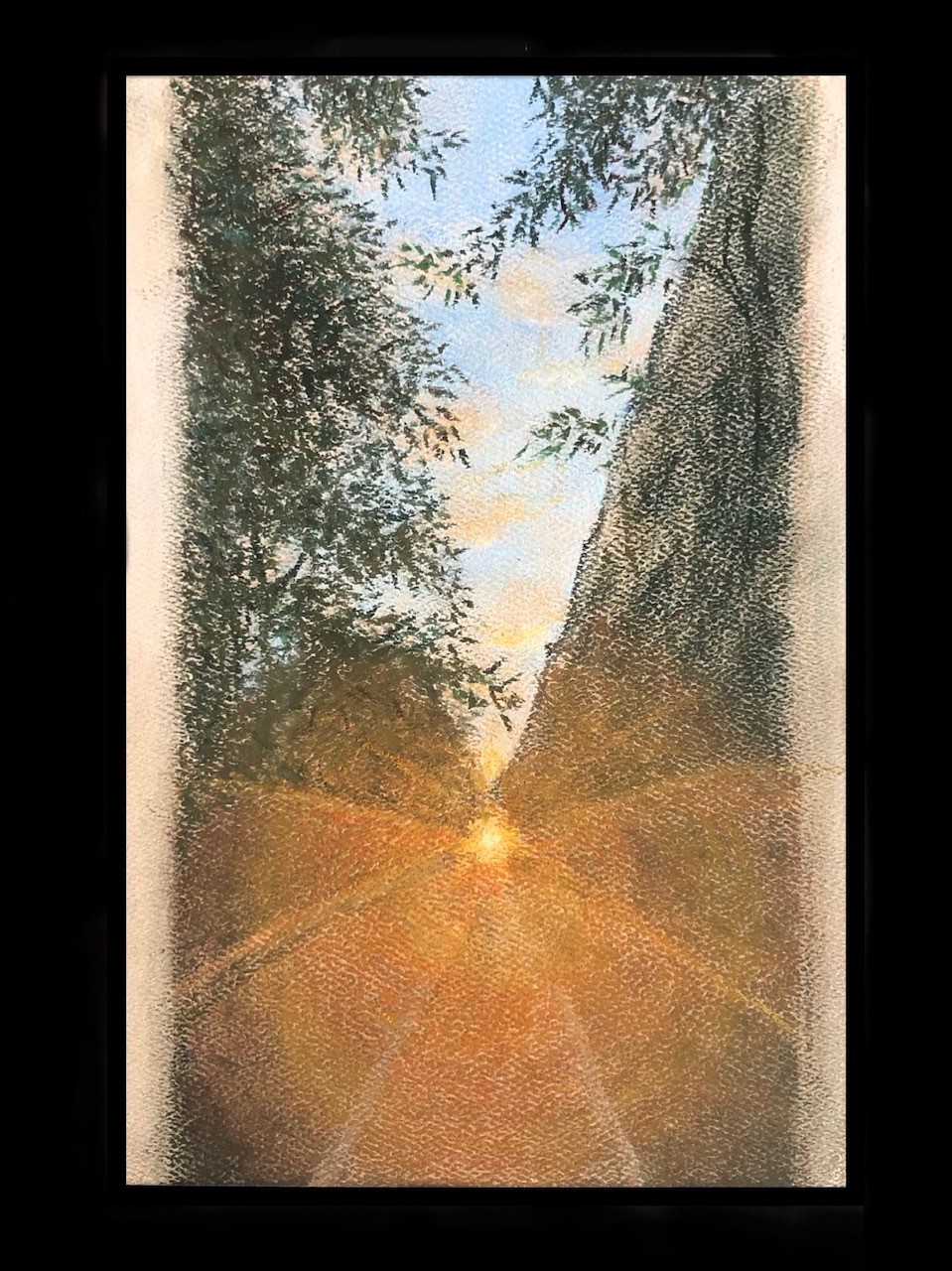 pastel drawing of a sunsetting between a cliff and some trees